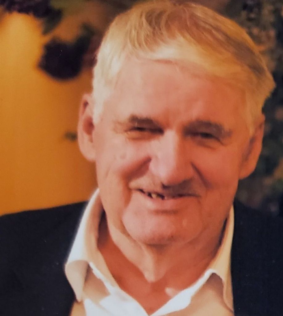 Ray  E. Mell