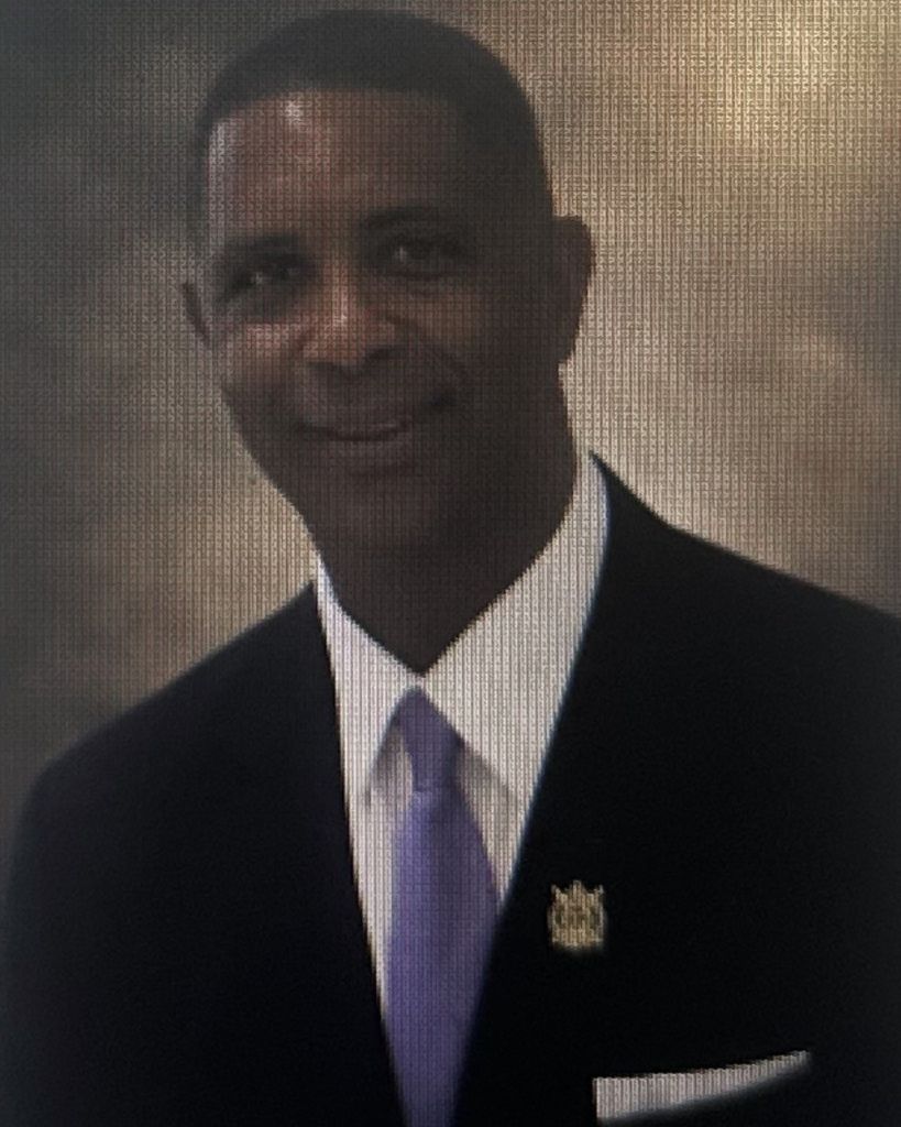 MINISTER DONALD "Duggie" BERNARD McCUTCHEON