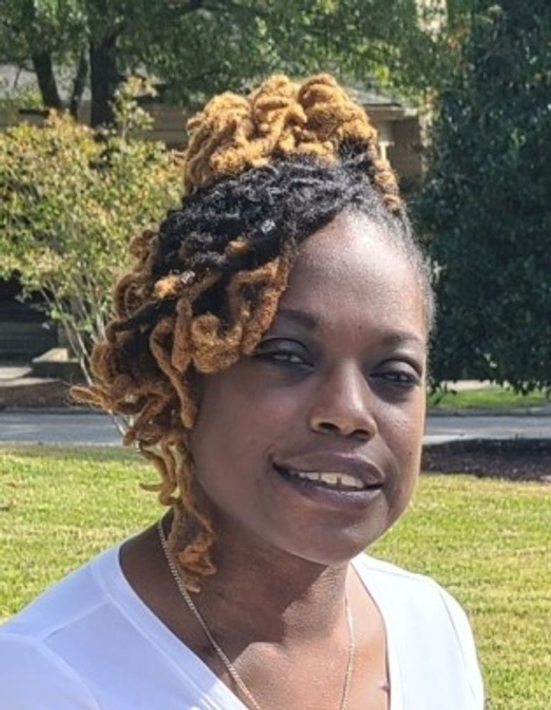 Adiatu Dawntreill Moore