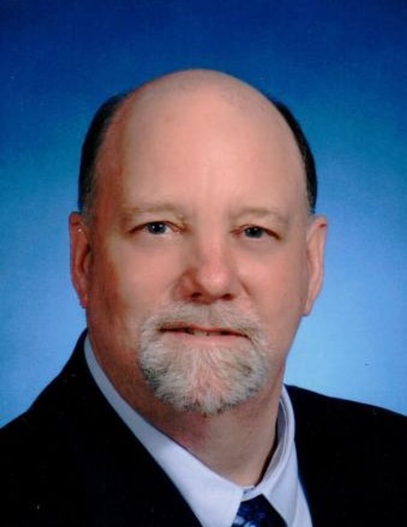 Darrell E. Schrader