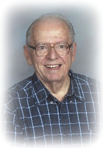 Dennis E. John