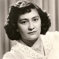Esther M. Olguin