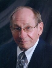 Gerald E.  Heiss