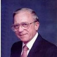 Curtis E. Brekke