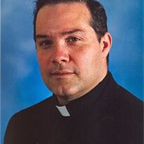 Father Wilfredo Comellas