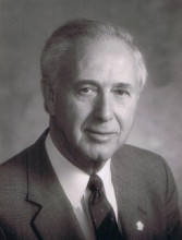 Paul  E. Hassett