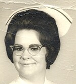 JANIS  E. MILLER