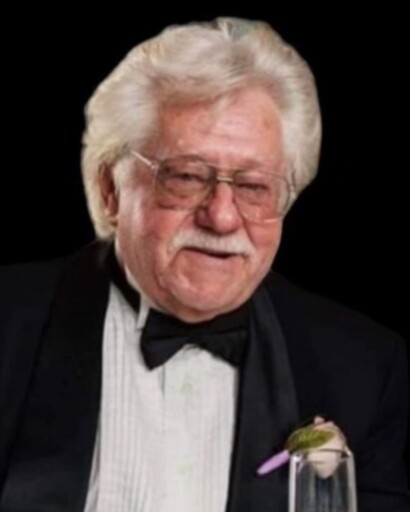 John E Thomas's obituary image