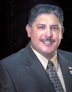 Carlos A. Cisneros