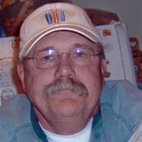 Thomas "Tom" E. Fleck