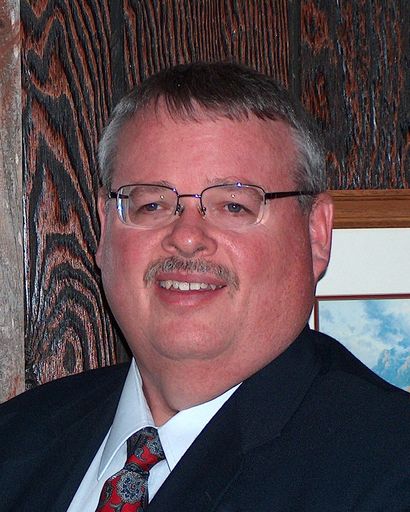 Mark E. Ortman