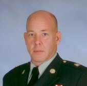 First Sergeant Bret  W. Carlson, (Retired)