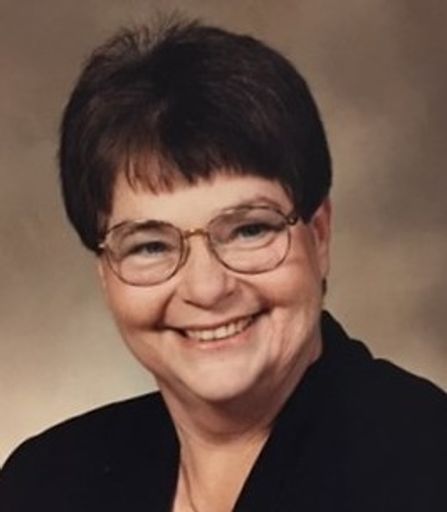 E.  Joanne Quenneville