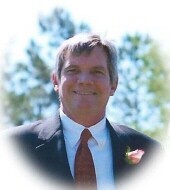 Comer Todd Hollis  Profile Photo