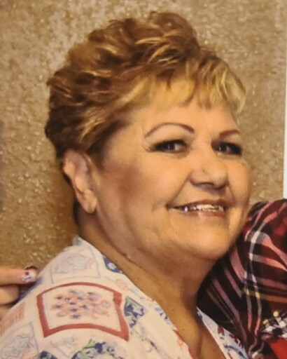 MARIA E. MANRIQUEZ CARO