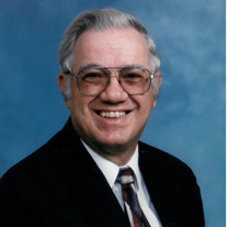 Claude E. Breeding