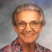 Susan E. Alland