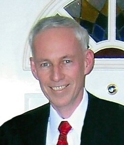 Douglas T. “Doug” Holmes