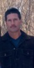 Warren  Keith HOLCOMB