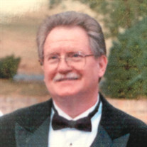 Charles E. "Charlie" Alvis