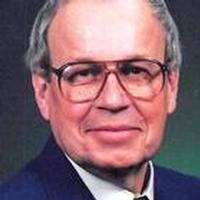 Charles E. Skov