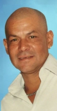 Carlos M. Charlie Serrano