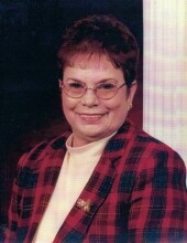 Ila  L. Cox 