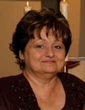 Sandra  A. "Sandy"` Evens