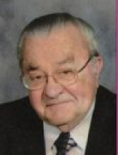 Clarence  E. Scharrer