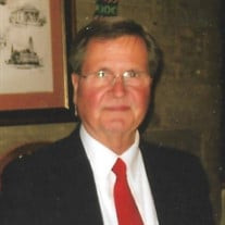 James E. Stricker