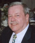 ROBERT J. CARROLL